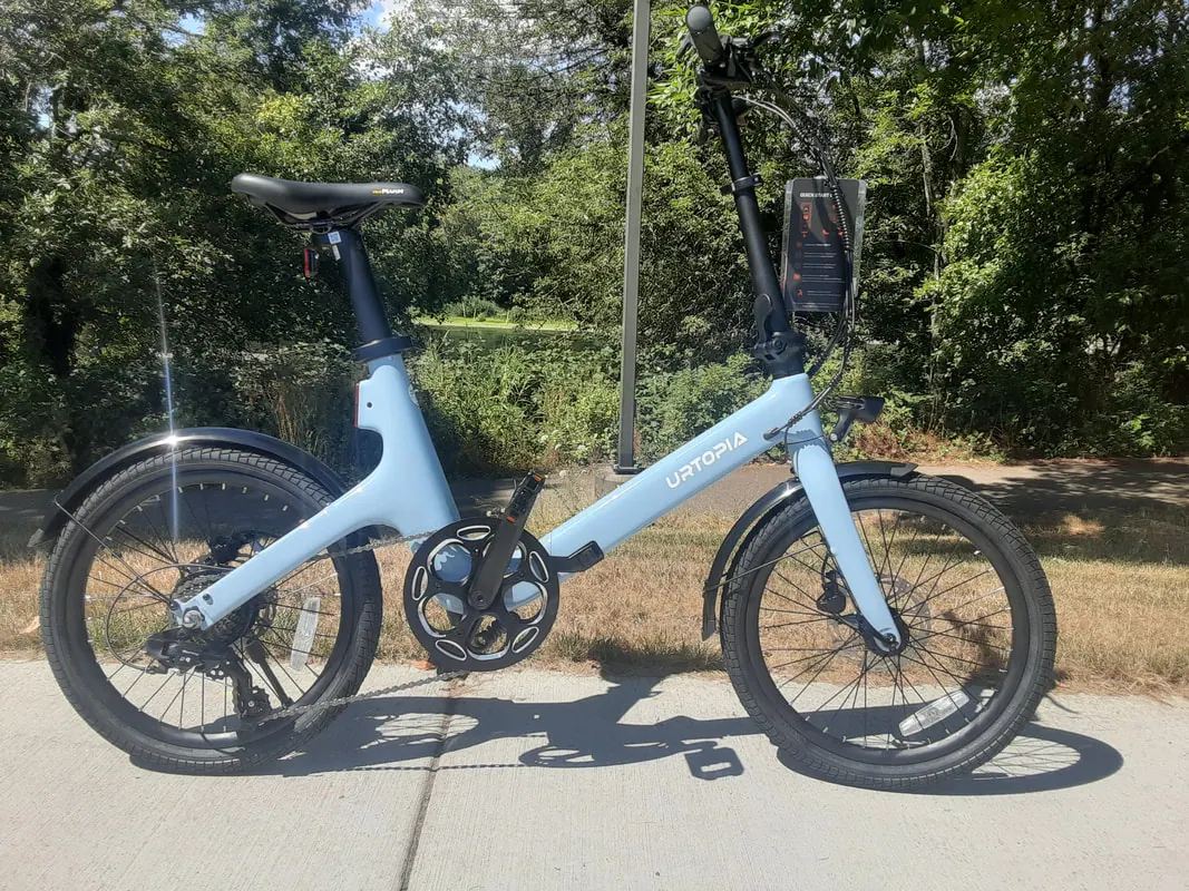 Urtopia Carbon Fold ST folding carbon e-bike in light blue