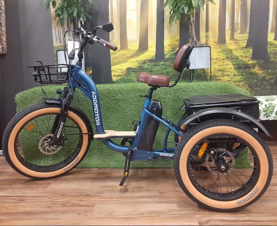 Addmotor Grandtan fat-tire electric trike in navy with a rear basket